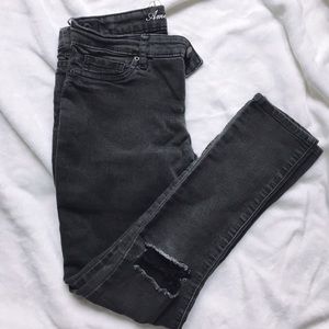 black ripped jeans